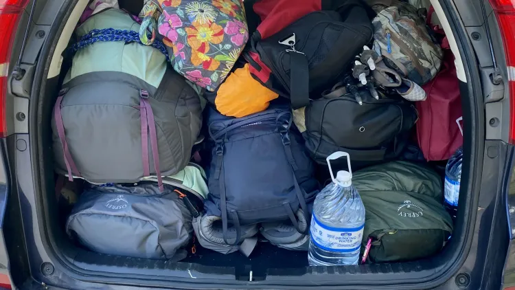 The back of Meera's CR-V, stuffed with backpacks and gear.