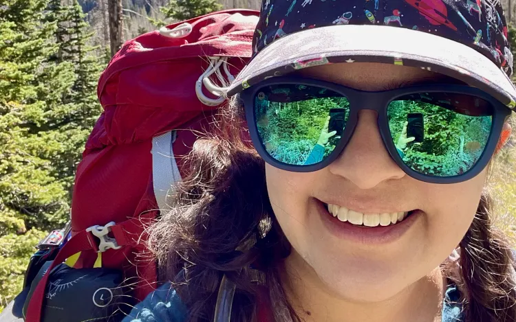 Selfie of Meera with her backpack on the Venable-Comanche Trail.